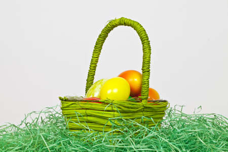 A Basket full of eggs  standing in the grasの写真素材