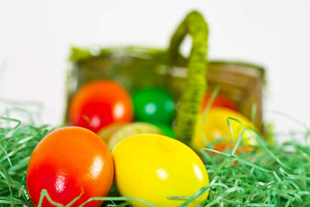 Some Colorfoul Easter Eggs did fall out of a green Basket.
