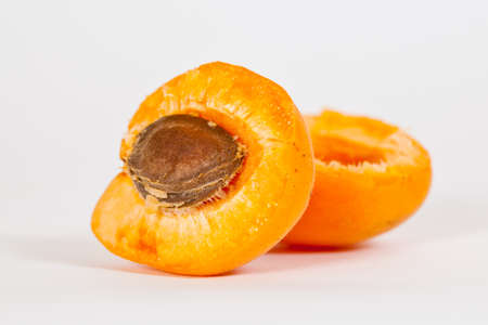 A sliced Apricot with the Stone in itの写真素材