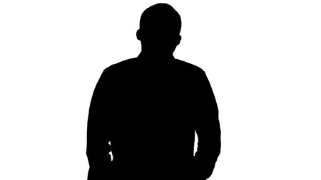 Silhouette Young man walking and whistling.の写真素材