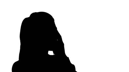 Silhouette Young beautiful woman in bright outfit enjoying the music.の写真素材