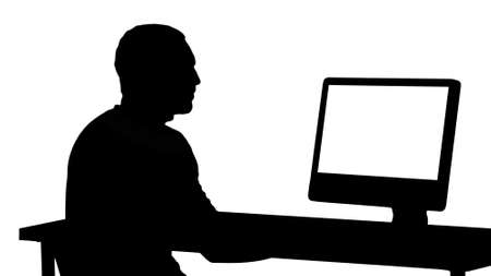 Silhouette Businessman working with a computer.の写真素材