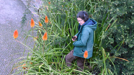 Sintra, Portugal - December 26, 2017: lady takes care of the garden in Quinta Da Regaleira.のeditorial素材