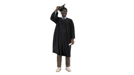 Excited african american male student throwing mortarboard in thの写真素材