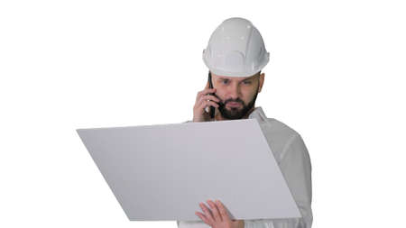 Engineer in formalwear and hardhat talking to client or contract