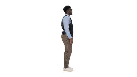 Young African American businessman standing looking straight aheadの写真素材