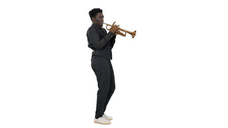 African american musician playing the trumpet expressively on whの写真素材