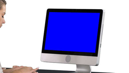 Woman using computer, white background. Blue Screen Mock-up Disp