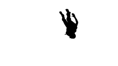 Silhouette Young construction worker in yellow hardhat doing hanの写真素材