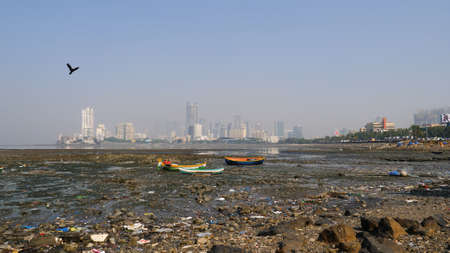 Mumbai, India - December 25, 2017: View of the city from water. Pollution.