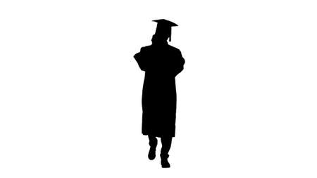 Graduating student walking and making a call, Alpha Channelの写真素材