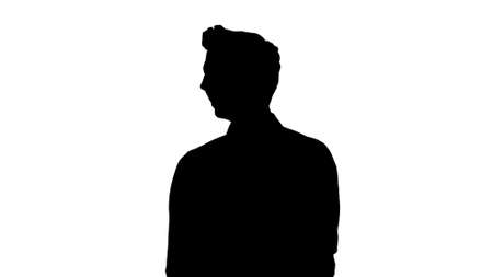 Silhouette Handsome young man laughing out loud.の写真素材