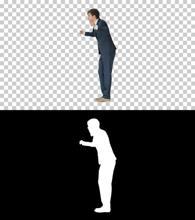 Arrogant businessman in a suit dancing, Alpha Channel with Silhoの写真素材