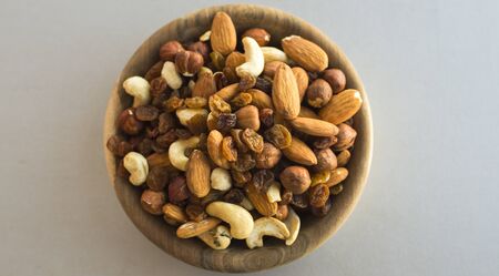 wooden bowl with mix nutsの写真素材