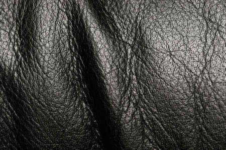 Black leather surface with wrinklesの写真素材