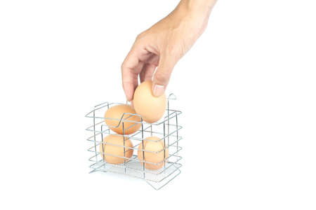 male hand pick egg の写真素材