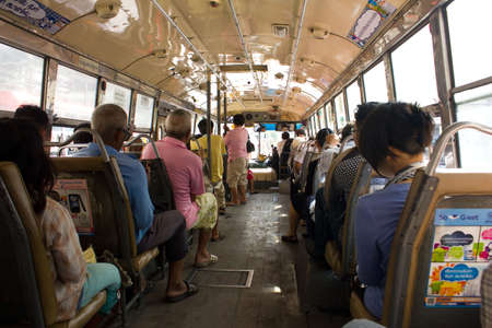 BANGKOK THAILAND - OCTOBER 27 :  Thai people on the regular  bus on October 27,2011 at  Bangkok ,Thailandのeditorial素材