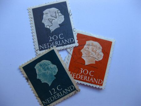 Old Dutch stamps with Queen Julianaのeditorial素材