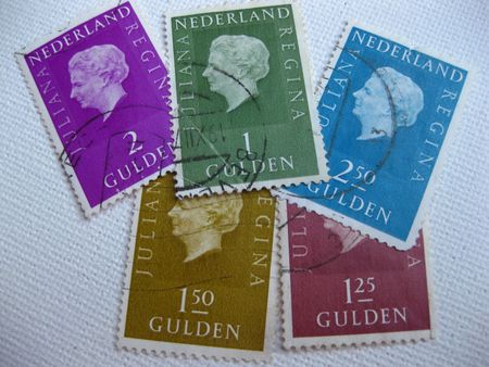 Old Dutch stamps with Queen Julianaのeditorial素材