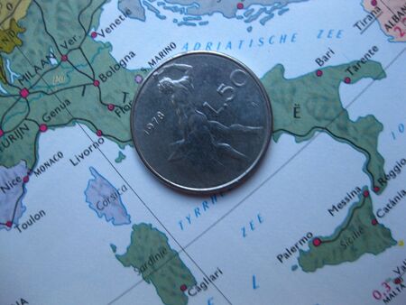 old Italian Lira on vintage Italian mapの写真素材