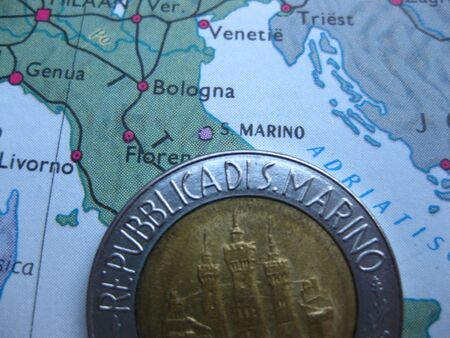 Coin on vintage map: 500 Lire from San Marinoの写真素材
