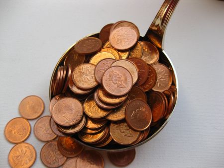 Soup ladle with coins