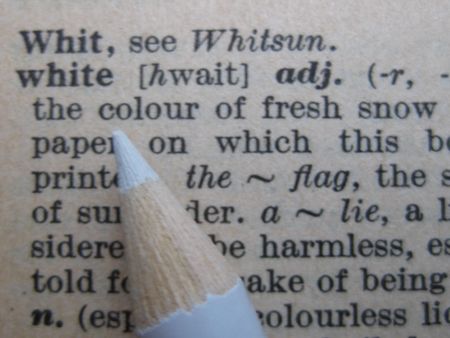 the dictionary: pencil on whiteの写真素材