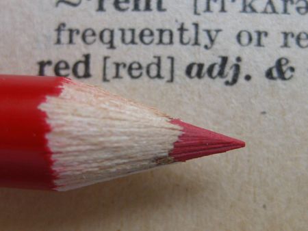 the dictionary: pencil on redの写真素材