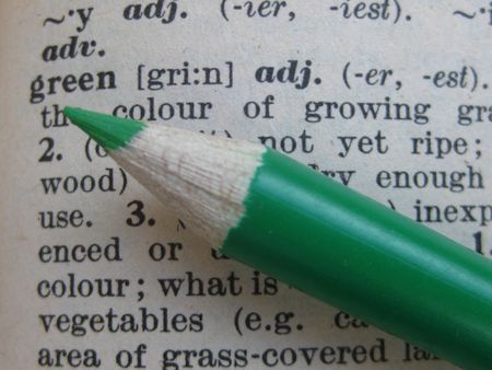 the dictionary: pencil on greenの写真素材
