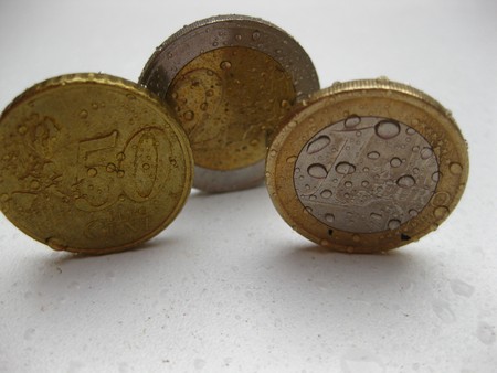 raindrops on euro coinsの写真素材