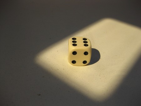 dice in lightの写真素材