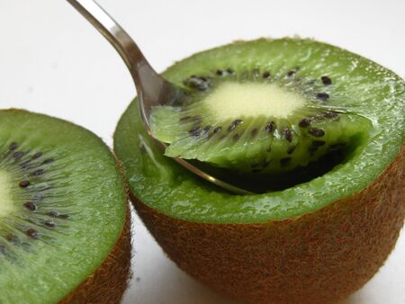 Kiwi fruit eaten with a spoonの写真素材