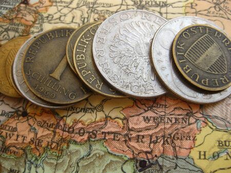 coins on vintage map: Austriaの写真素材