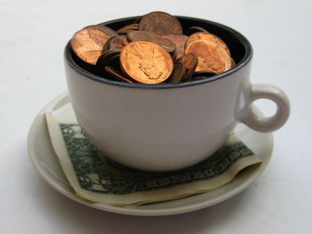 cup of money - US dollarsの写真素材