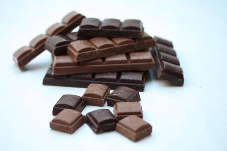 pieces of a chocolate bar, pure and milkの写真素材