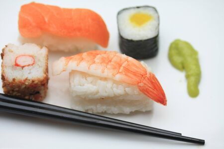 traditional Japanese sushi with chopsticks and Japanese condiment, wasabiの写真素材