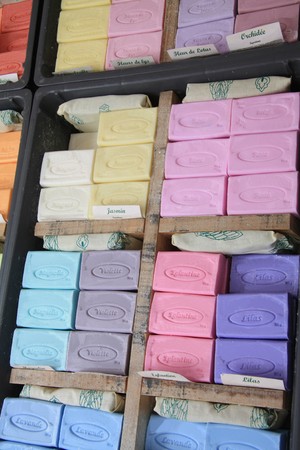 Colorful bars of soap, a local product of the Provence. Displayed in boxes on a market in Bédoinの写真素材