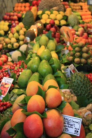 Different sorts of fruits, displayed on a Spanish marketのeditorial素材