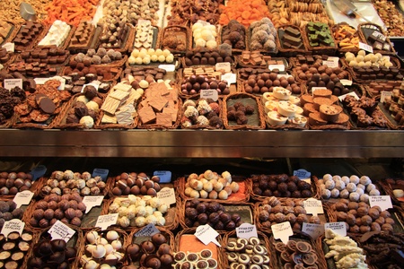 Choclates and pralines in all different sorts displayed on a Spanish marketのeditorial素材