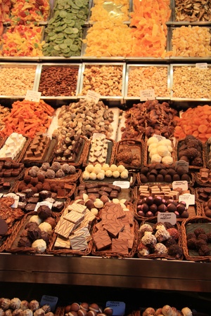 Choclates and pralines in all different sorts displayed on a Spanish marketのeditorial素材