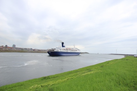 May 5th, 2012 Velsen, the Netherlands. Ocean Countess on canal towards North Sea. The Ocean Countess is a 541ft long cruiseship, built in 1976 and owned by Cruise & Maritime Voyagesのeditorial素材