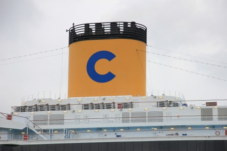 May 14th 2012, IJmuiden, the Netherlands. Costa Deliziosa. The Costa Deliziosa is a 957.8ft long cruise ship, built in 2010, owned and operated by Costa Crociere. Detail of chimneyのeditorial素材