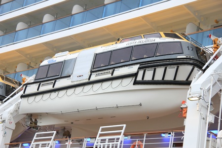 May 14th 2012, IJmuiden, the Netherlands. Costa Deliziosa. The Costa Deliziosa is a 957.8ft long cruise ship, built in 2010, owned and operated by Costa Crociere. Detail of a lifeboatのeditorial素材