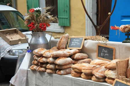 Typical French sorts of bread on a local market in the Provence, Franceのeditorial素材