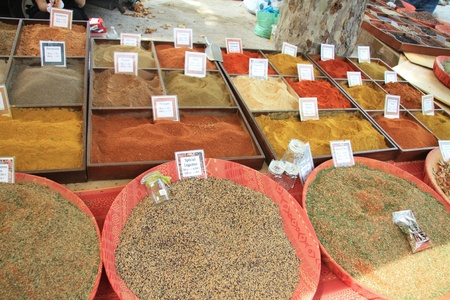 Different sorts of pepper and other spices on a french marketのeditorial素材