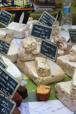 Different sorts of cheese on a local French marketのeditorial素材