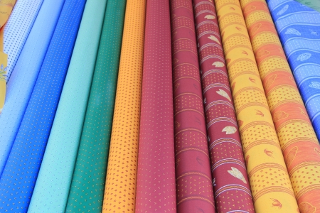 Traditional Provencal patterns on rolls of cotton on a local marketの写真素材