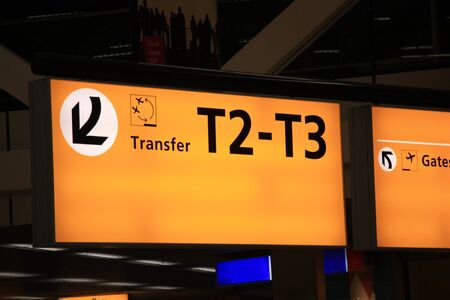 Big yellow information board with international known symbolsのeditorial素材