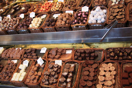 Chocolate pralines in different shapes and colors at a market in Barcelona, Spainのeditorial素材