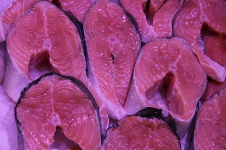 Salmon steaks on ice in a fish shop
